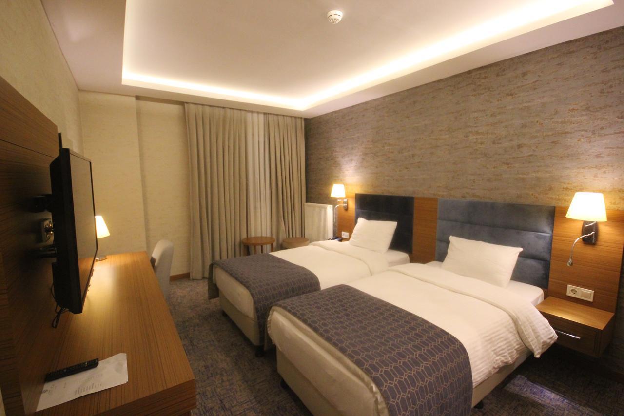 Garden Zara Hotel Bagian luar foto