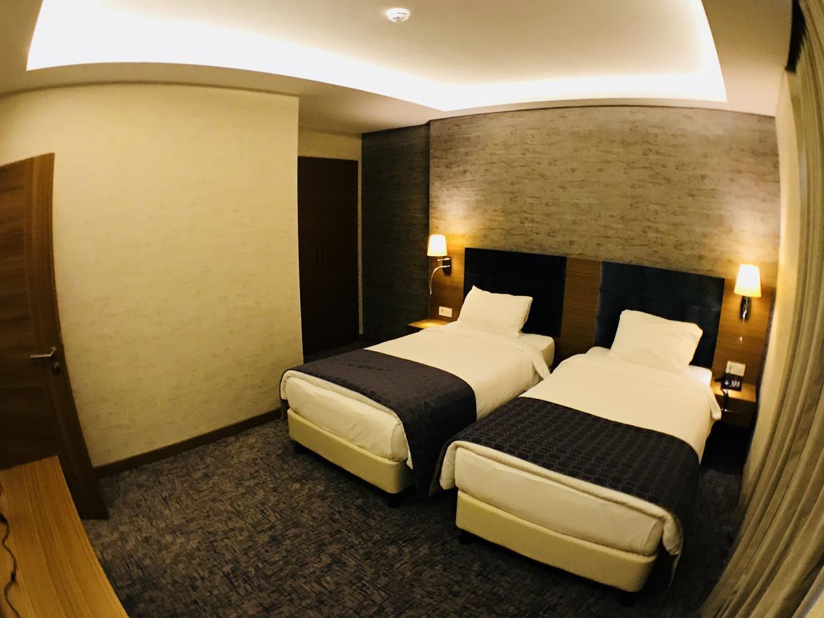 Garden Zara Hotel Bagian luar foto